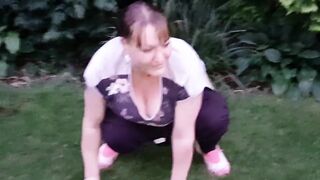 pissing and screwing a bottle in the park