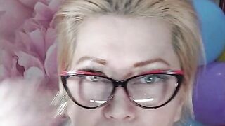 Dildoing of a aged doxy on a background of colorful balloons ...))