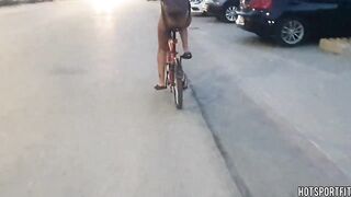 Wild Angel Biking Undressed on Public Road: Flaunting Her Body and Vagina!