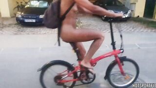 Wild Angel Biking Undressed on Public Road: Flaunting Her Body and Vagina!