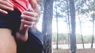 Hawt dude jacking off in public near the road.