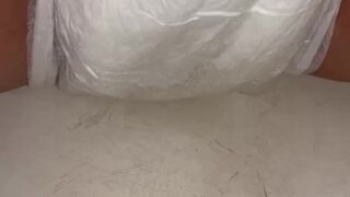 Chick fills up diaper with urinate until it overflows out the side