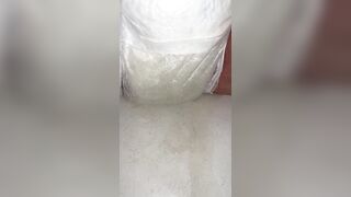 Chick fills up diaper with urinate until it overflows out the side