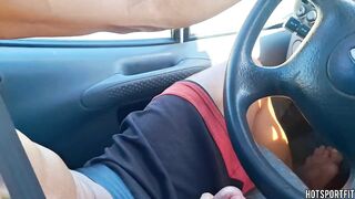 Hawt Dude drives whilst masturbating his large schlong, gets tugjob and footjob from hot passenger