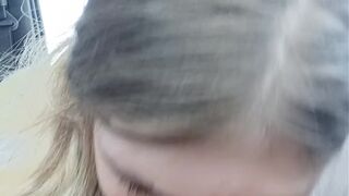 Unfathomable mouth by teen in public park.