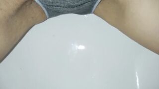 wetting: urinated in gray pants
