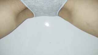 wetting: urinated in gray pants