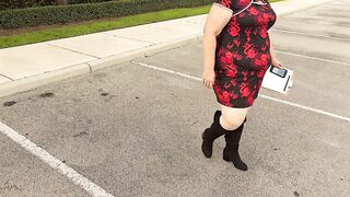 Large butt real estate agent in short mini costume doing property inspections with legs open - sexy big beautiful woman