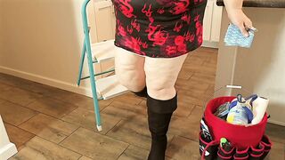 Large butt real estate agent in short mini costume doing property inspections with legs open - sexy big beautiful woman