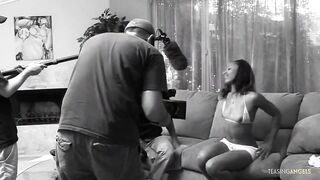 In preparation for his large white penis the black babe rubs her quivering clitoris gently