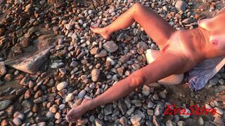 pissing lying on the seashore