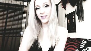 cute golden-haired camgirl brushes her lengthy silvery hair