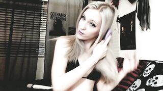 cute golden-haired camgirl brushes her lengthy silvery hair