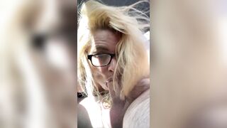 Real hooker wearing glasses gets on her knees in public to take a load of cum in her throat after sucking off an grand-daddy for cash