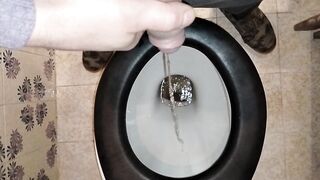 A PAIR PEES IN A PUBLIC LATRINE WITH GOLDEN SHOWER FOR HIM