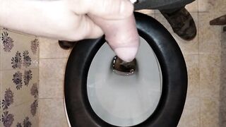 A PAIR PEES IN A PUBLIC LATRINE WITH GOLDEN SHOWER FOR HIM