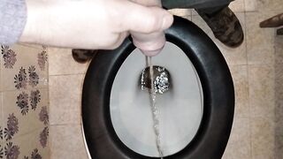 A PAIR PEES IN A PUBLIC LATRINE WITH GOLDEN SHOWER FOR HIM