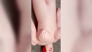 Pumping up a big blow up doll