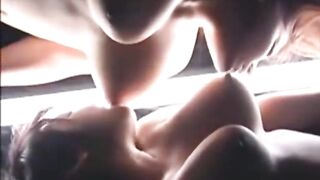 two japanese girls titty sucking each other's tits NICE