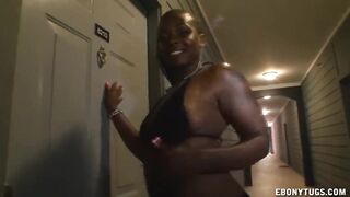 Obese black jerks off a large jock