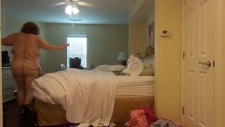 big beautiful woman nurse Vicki undresses and puts on a suit quick change