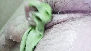 See a bulky stud clean his thick wang and large balls