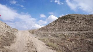 On Top of Hill with Red Flag