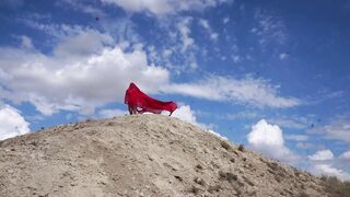 On Top of Hill with Red Flag