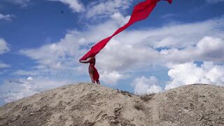On Top of Hill with Red Flag