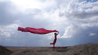 On Top of Hill with Red Flag