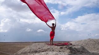 On Top of Hill with Red Flag