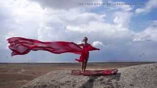 On Top of Hill with Red Flag