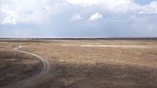 On Top of Hill with Red Flag