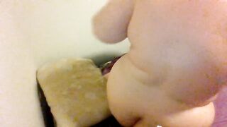 large woman rides chicken pillow and cums