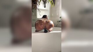 Oiled up tattooed hottie rides sex tool