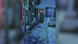 Tattooed Dude Playing With Dong