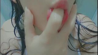 beauty wearing a white tshirt and masturbation at shower