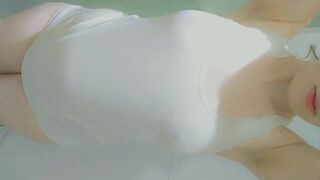 beauty wearing a white tshirt and masturbation at shower