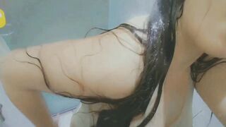 beauty wearing a white tshirt and masturbation at shower