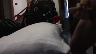 My wife is hogtied on the daybed with an open gag on her throat. I banged her mouth and cummed on her