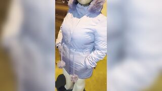 Older woman wearing red thread in transparent leggings, captured on the street