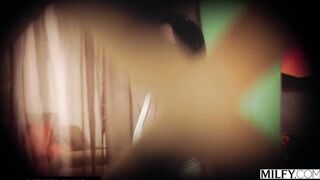 A sunbathing trophy wife seduces a peeping tom.