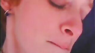 Skinny redhead girl is used as a sex toy by mature women in latex outfits