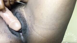 Hawt ebony gal rubs a sex tool on her snatch and cums hard
