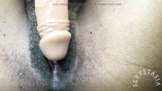 Hawt ebony gal rubs a sex tool on her snatch and cums hard