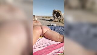 This babe shows her on the nudist beach