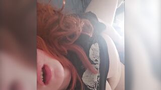 Curvy redhead riding sex-toy