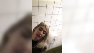 Two lesbians in night club bathroom