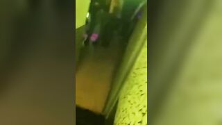 Two lesbians in night club bathroom