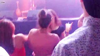 Girls making out during concert